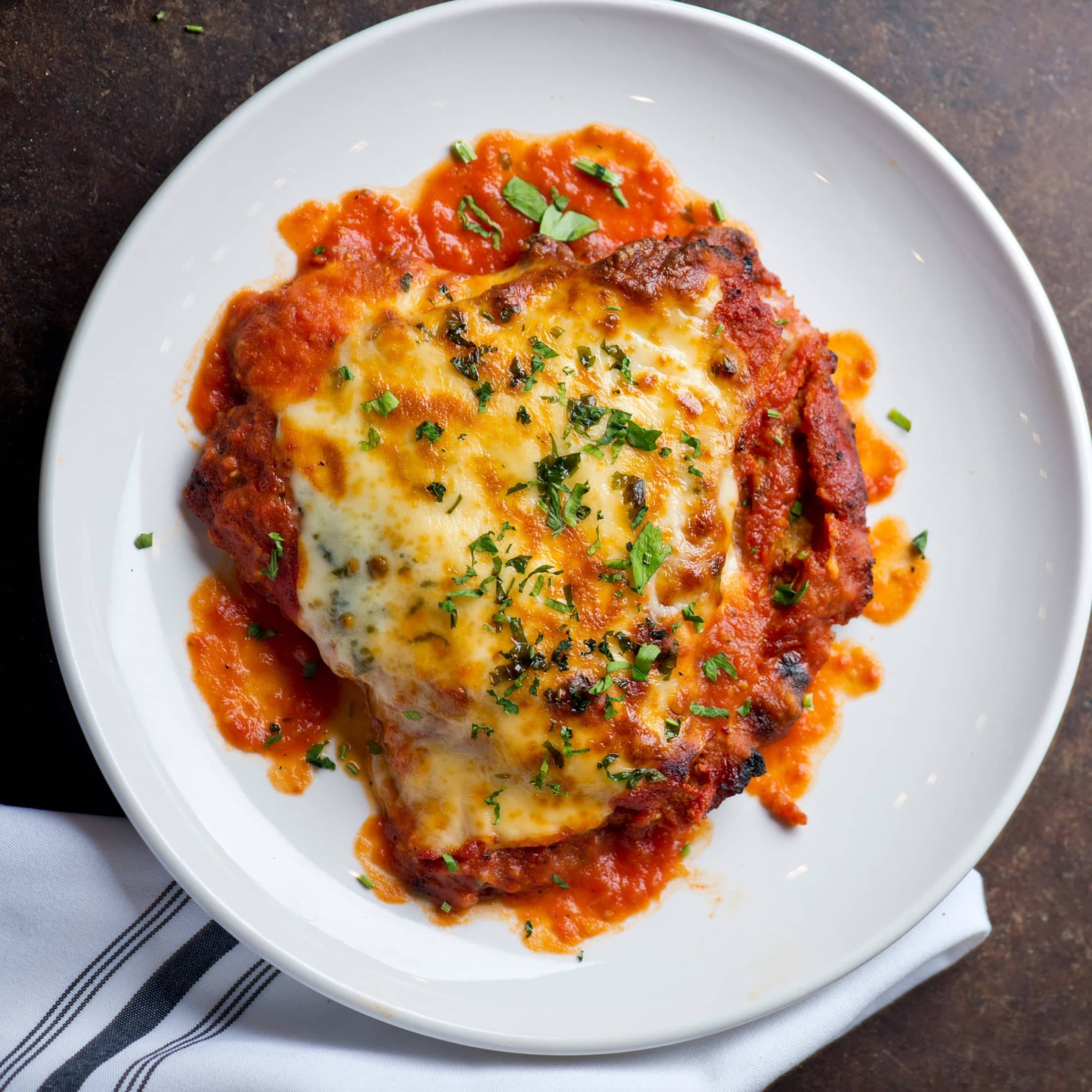 Chicken Parmesan with Herb-Roasted Potatoes & Broccoli